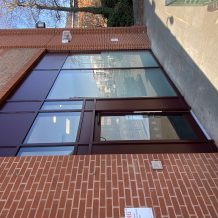 Glass and aluminium entryway for office building