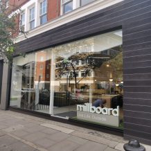 Millboards Modern Shop Front Design with Large Windows